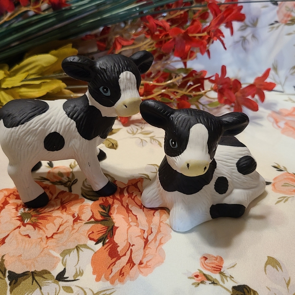 Two The ceramic Cow figurines for sale collectibles New